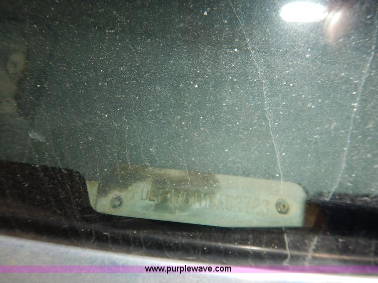 image for item J3860 1991 Ford F450 Super Duty XL flatbed dump truck