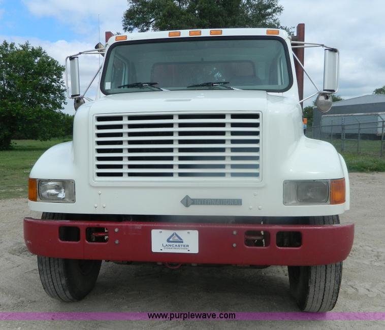 image for item K8102 1999 International 4900 flatbed dump truck