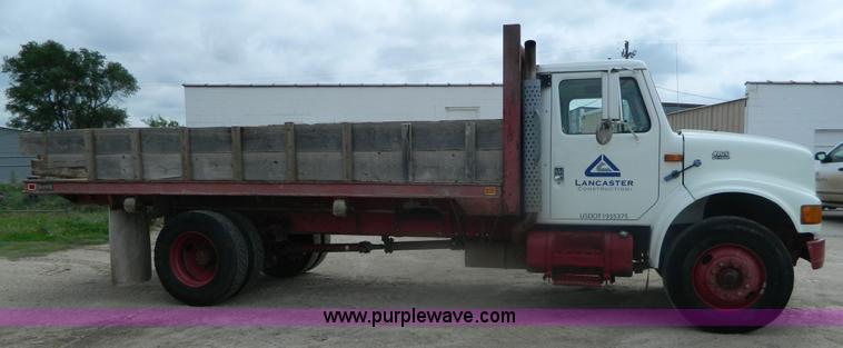image for item K8102 1999 International 4900 flatbed dump truck