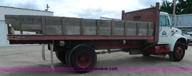 image for item K8102 1999 International 4900 flatbed dump truck