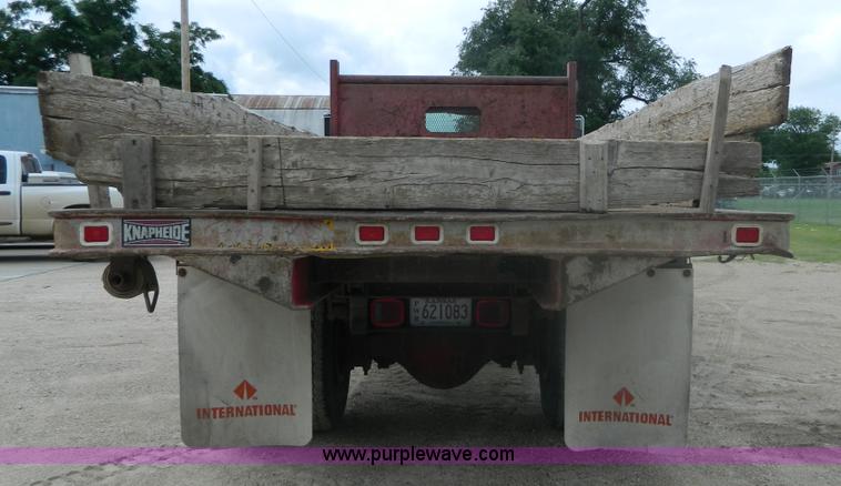 image for item K8102 1999 International 4900 flatbed dump truck