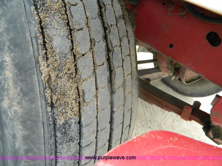 image for item K8102 1999 International 4900 flatbed dump truck