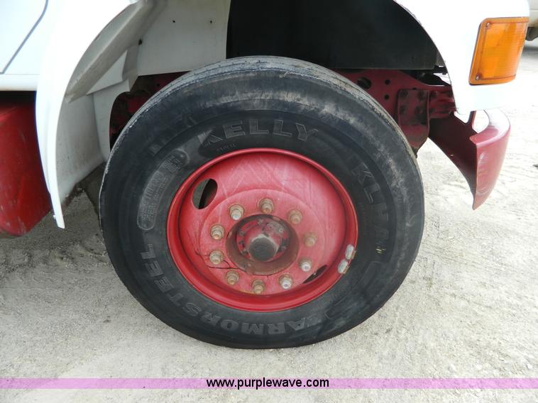 image for item K8102 1999 International 4900 flatbed dump truck