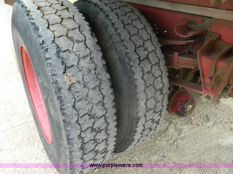 image for item K8102 1999 International 4900 flatbed dump truck