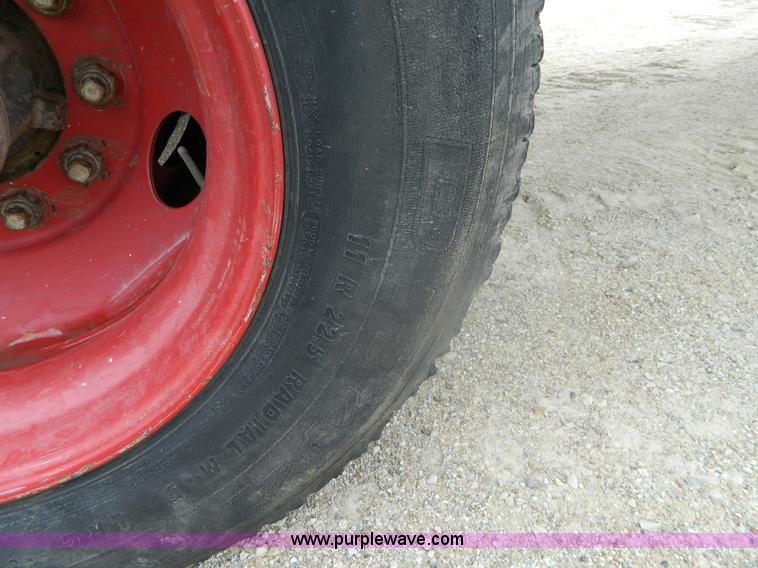 image for item K8102 1999 International 4900 flatbed dump truck