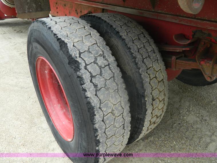 image for item K8102 1999 International 4900 flatbed dump truck