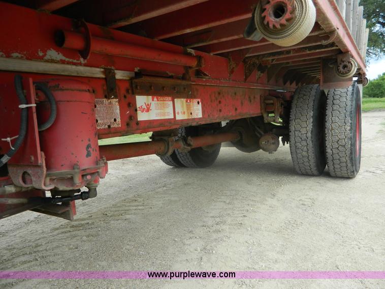 image for item K8102 1999 International 4900 flatbed dump truck