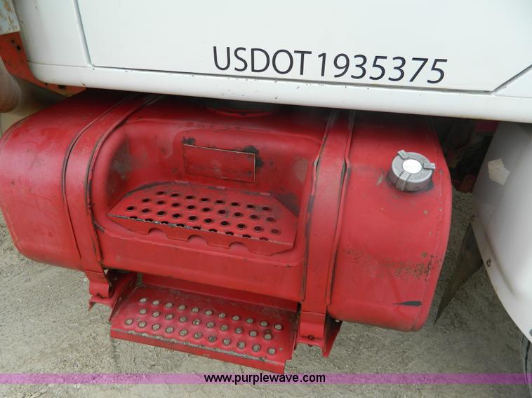 image for item K8102 1999 International 4900 flatbed dump truck