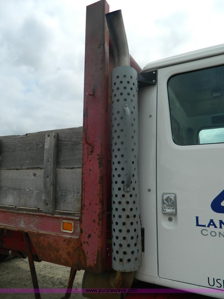 image for item K8102 1999 International 4900 flatbed dump truck