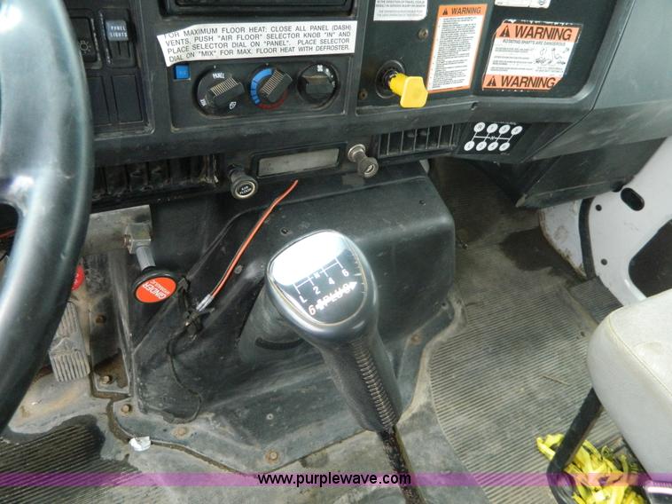 image for item K8102 1999 International 4900 flatbed dump truck