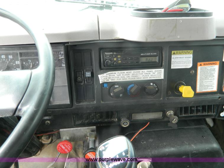 image for item K8102 1999 International 4900 flatbed dump truck