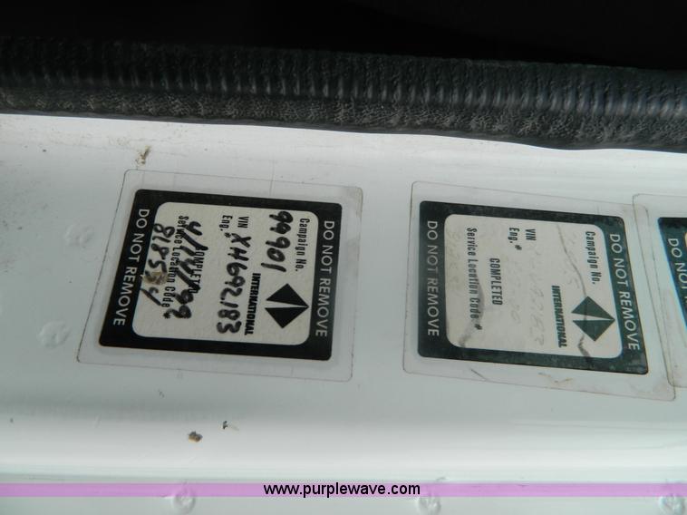 image for item K8102 1999 International 4900 flatbed dump truck