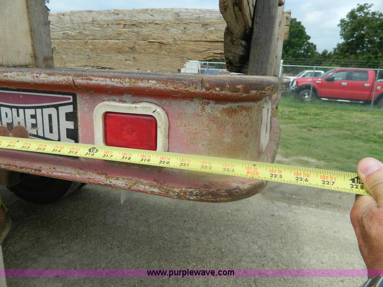 image for item K8102 1999 International 4900 flatbed dump truck