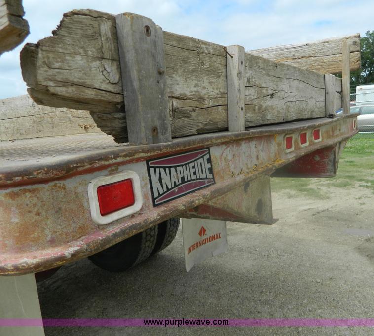 image for item K8102 1999 International 4900 flatbed dump truck