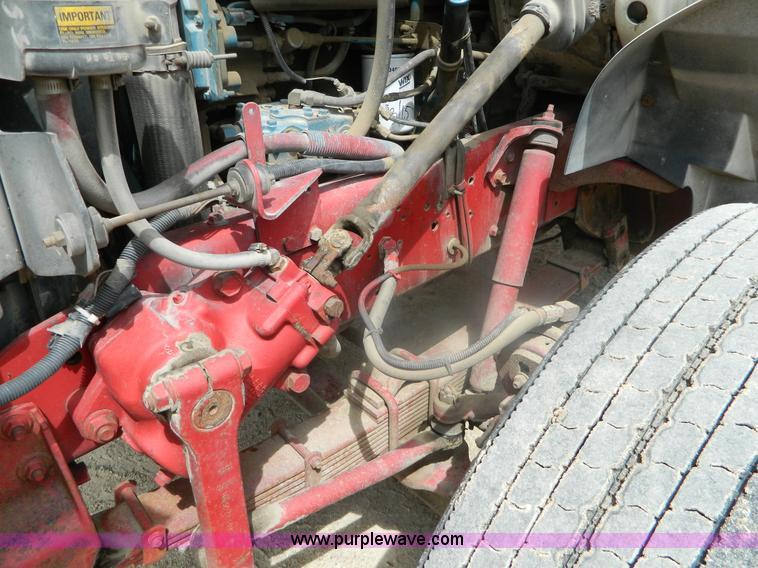 image for item K8102 1999 International 4900 flatbed dump truck