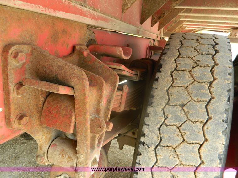 image for item K8102 1999 International 4900 flatbed dump truck