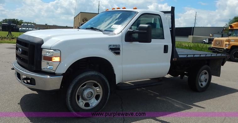 image for item J3803 2008 Ford F350 Super Duty XL flatbed pickup truck