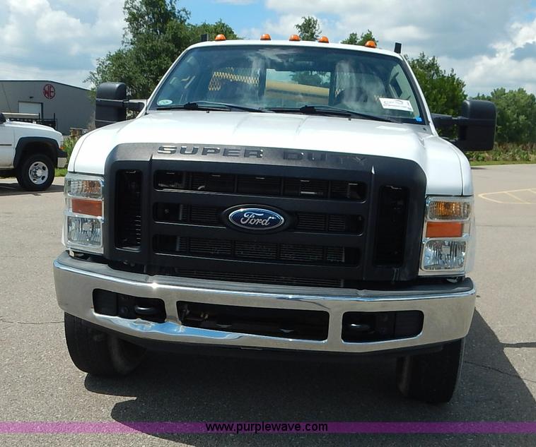 image for item J3803 2008 Ford F350 Super Duty XL flatbed pickup truck