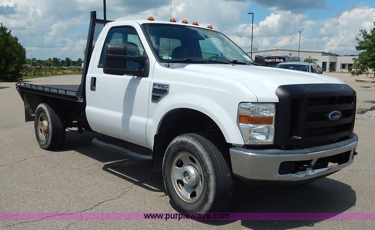image for item J3803 2008 Ford F350 Super Duty XL flatbed pickup truck