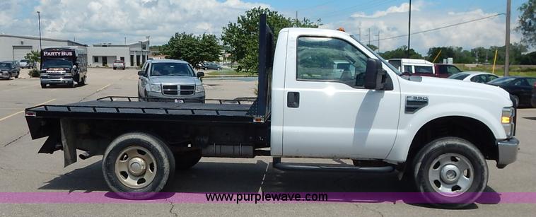 image for item J3803 2008 Ford F350 Super Duty XL flatbed pickup truck