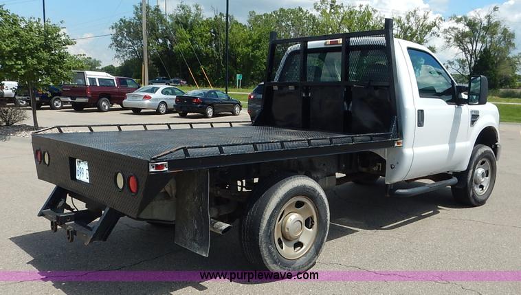 image for item J3803 2008 Ford F350 Super Duty XL flatbed pickup truck