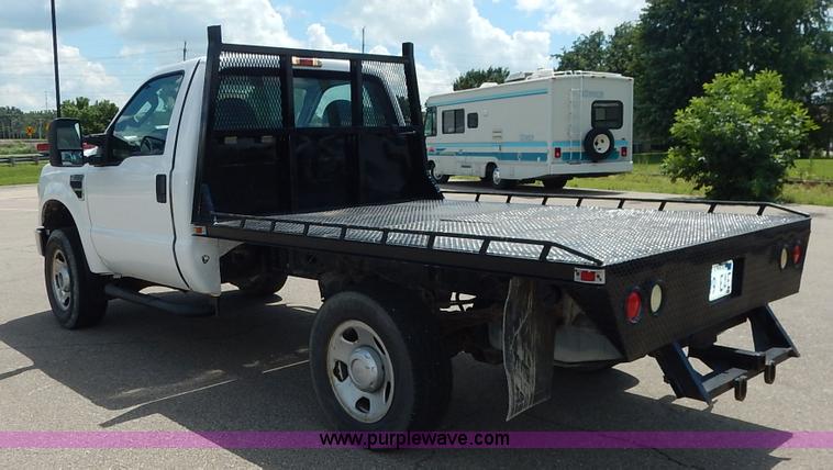 image for item J3803 2008 Ford F350 Super Duty XL flatbed pickup truck