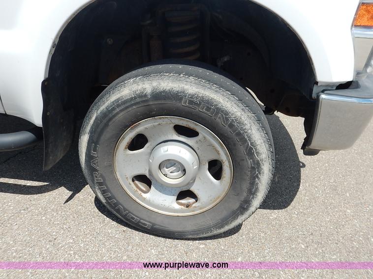 image for item J3803 2008 Ford F350 Super Duty XL flatbed pickup truck