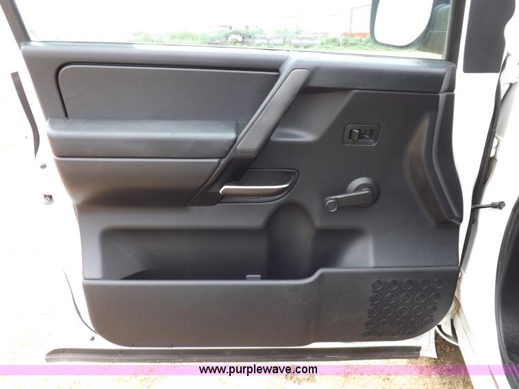 image for item J6951 2011 Nissan Titan S King Cab flatbed pickup truck