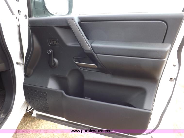 image for item J6951 2011 Nissan Titan S King Cab flatbed pickup truck