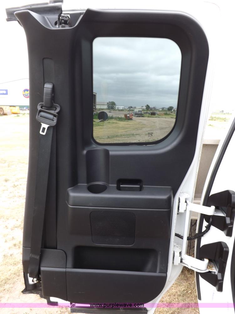 image for item J6951 2011 Nissan Titan S King Cab flatbed pickup truck