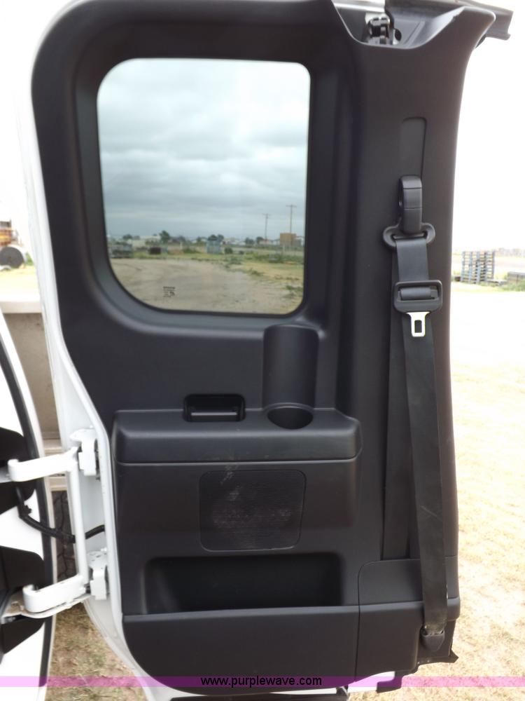 image for item J6951 2011 Nissan Titan S King Cab flatbed pickup truck
