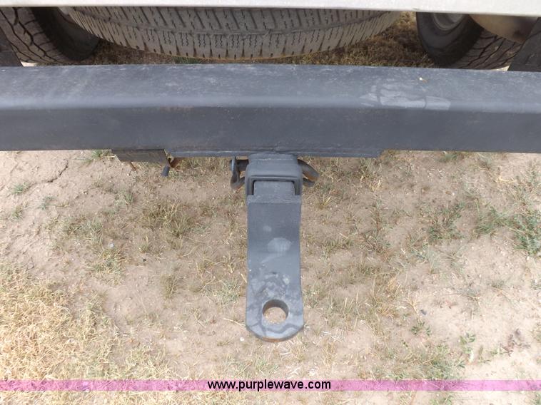 image for item J6951 2011 Nissan Titan S King Cab flatbed pickup truck