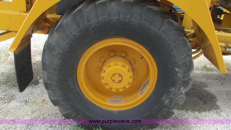 image for item J8543 Athey 7-12 asphalt pickup machine