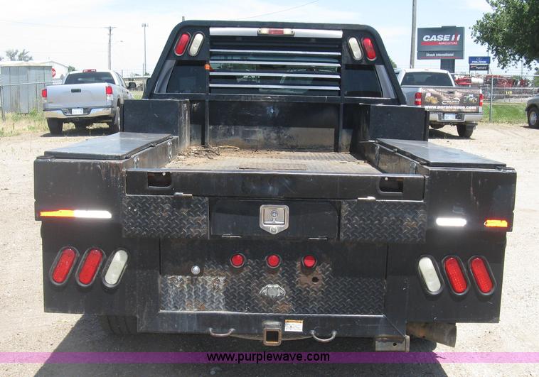 image for item K8652 2010 Ford F350 Super Duty XLT Crew Cab flatbed pickup truck