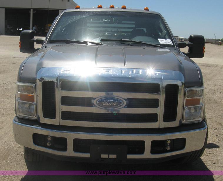 image for item K8652 2010 Ford F350 Super Duty XLT Crew Cab flatbed pickup truck