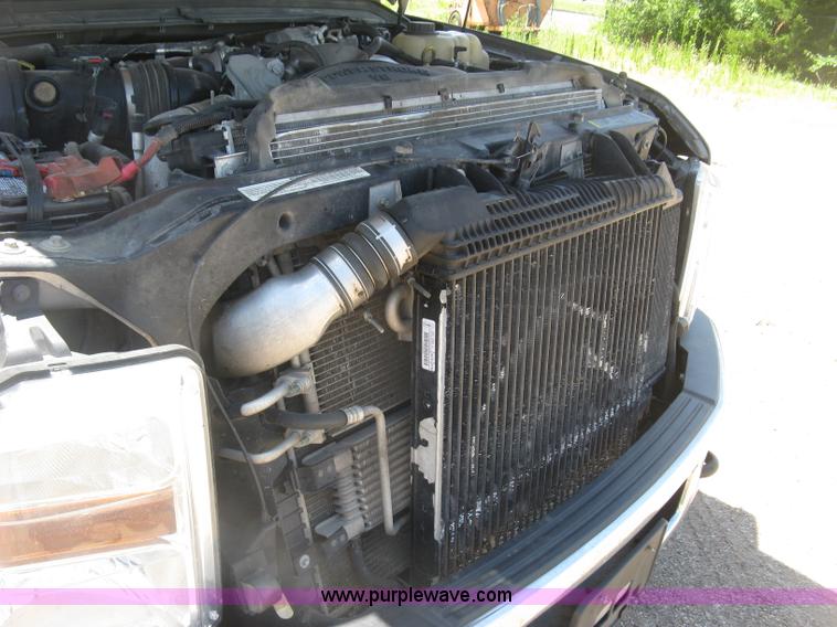 image for item K8652 2010 Ford F350 Super Duty XLT Crew Cab flatbed pickup truck