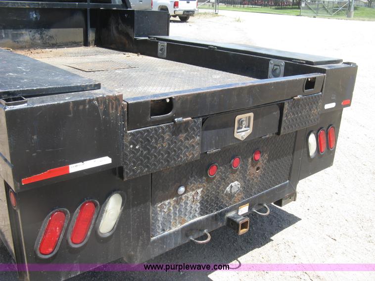 image for item K8652 2010 Ford F350 Super Duty XLT Crew Cab flatbed pickup truck