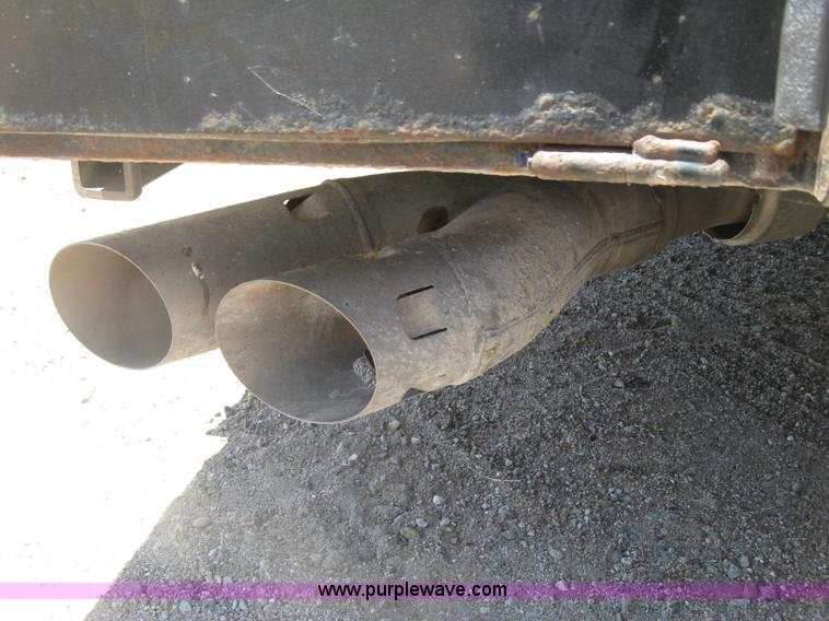 image for item K8652 2010 Ford F350 Super Duty XLT Crew Cab flatbed pickup truck