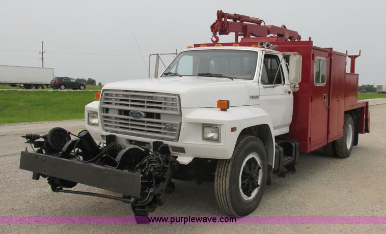 image for item H3268 1991 Ford F800 crane truck with Hi-Rail/Road Rail