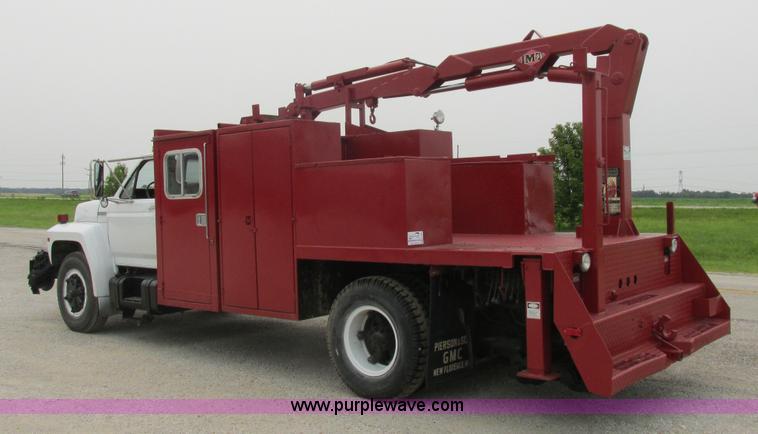 image for item H3268 1991 Ford F800 crane truck with Hi-Rail/Road Rail