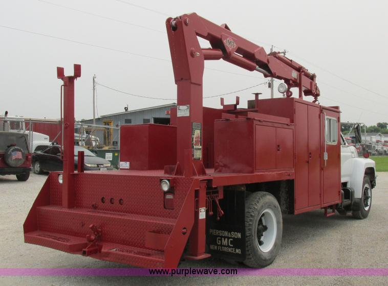 image for item H3268 1991 Ford F800 crane truck with Hi-Rail/Road Rail
