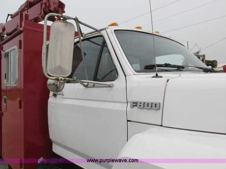 image for item H3268 1991 Ford F800 crane truck with Hi-Rail/Road Rail