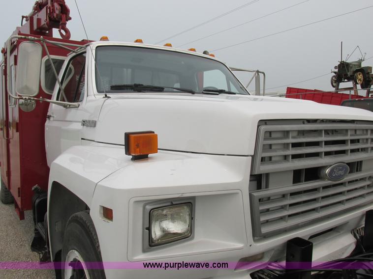 image for item H3268 1991 Ford F800 crane truck with Hi-Rail/Road Rail