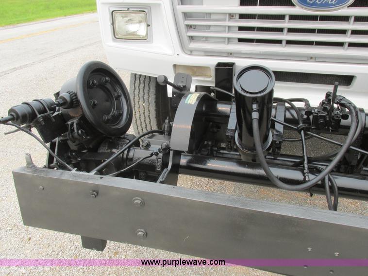 image for item H3268 1991 Ford F800 crane truck with Hi-Rail/Road Rail