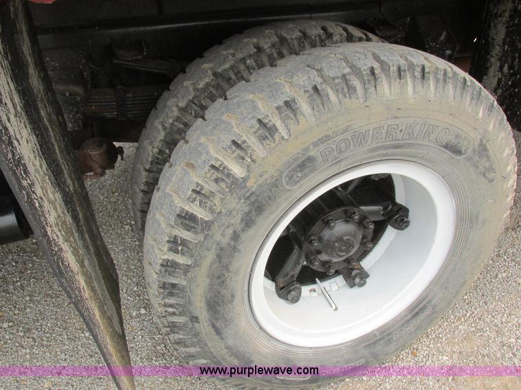 image for item H3268 1991 Ford F800 crane truck with Hi-Rail/Road Rail