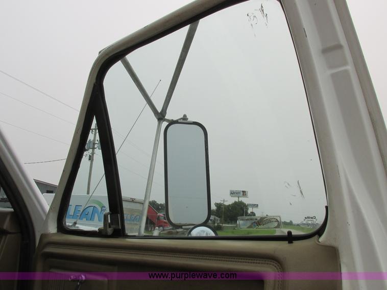 image for item H3268 1991 Ford F800 crane truck with Hi-Rail/Road Rail