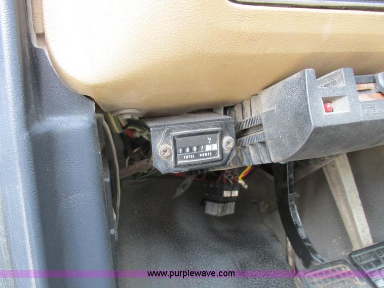 image for item H3268 1991 Ford F800 crane truck with Hi-Rail/Road Rail