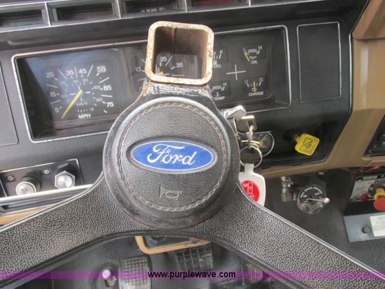 image for item H3268 1991 Ford F800 crane truck with Hi-Rail/Road Rail