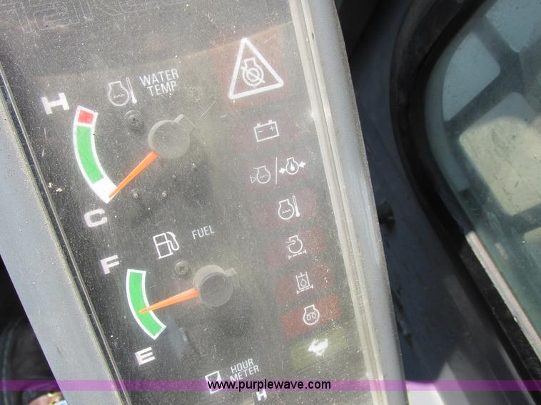 image for item H3273 2004 Takeuchi TL150 skid steer