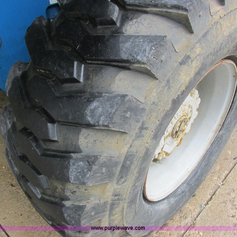 image for item H3300 2000 Genie S-60 boom lift